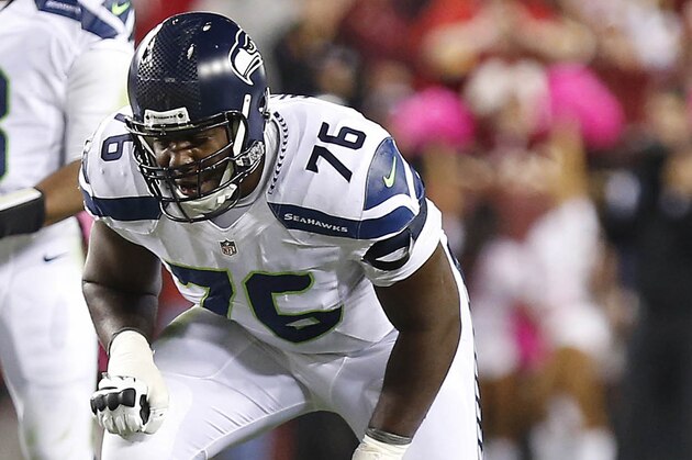 Oct 6, 2014; Landover, MD, USA; Seattle Seahawks tackle Russell Okung (76) lines up against the Washington Redskins at FedEx Field. Mandatory Credit: Geoff Burke-USA TODAY Sports