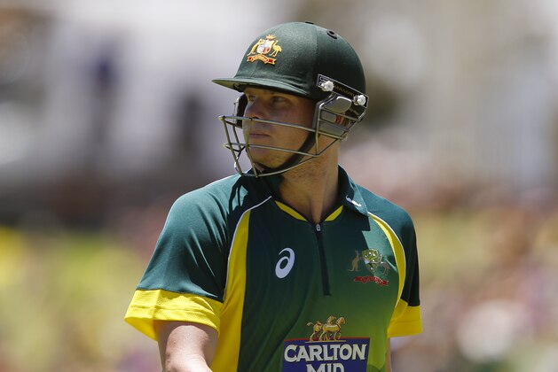 Australia's Steve Smith walks back to the pavilion after loosing his wicket for 10 runs during their second one day international cricket match against South Africa in Perth, Australia, Sunday, Nov. 16, 2014. (AP Photo/Theron Kirkman)