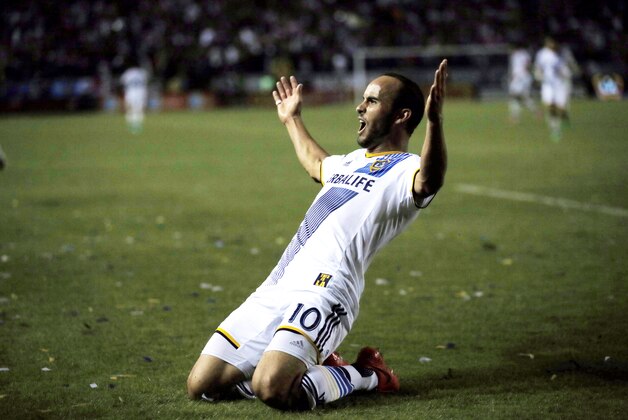 Los Angeles Galaxy's Landon Donovan celebrates scoring a goal against Real Salt Lake during the second half of an MLS soccer Western Conference playoff series game, in Carson, Calif., Sunday, Nov. 9, 2014. (AP Photo/Danny Moloshok)