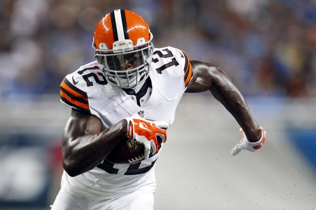 FILE - In this Aug. 9, 2014, file photo, Cleveland Browns wide receiver Josh Gordon (12) runs with the ball  in the first half of a preseason NFL football game against the Detroit Lions at Ford Field in Detroit. A person familiar with Gordon's situation says the suspended wide receiver wants to play in the Canadian Football League, but is prohibited from doing so. Under CFL rules, a player suspended by the NFL and under contract is not eligible to play in Canada. But if the Browns released Gordon, he would be able to play elsewhere.   (AP Photo/Rick Osentoski, File)