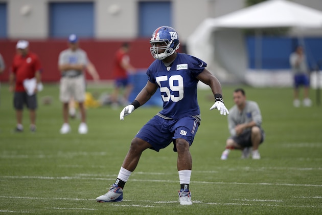 New York Giants' Devon Kennard practices during a NFL football camp in East Rutherford, N.J., Wednesday, July 23, 2014. (AP Photo/Seth Wenig)