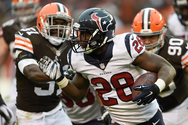 CLEVELAND, OH - NOVEMBER 16:  Alfred Blue #28 of the Houston Texans carries the ball during the third quarter against the Cleveland Browns at FirstEnergy Stadium on November 16, 2014 in Cleveland, Ohio.  (Photo by Jason Miller/Getty Images)