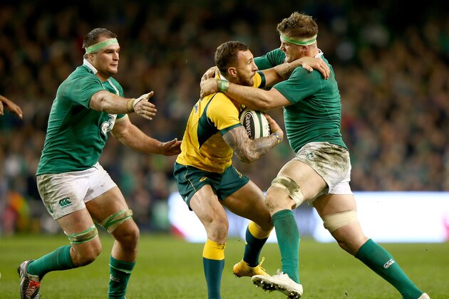 DUBLIN, IRELAND - NOVEMBER 22:  Kurtley Beale of Australia is tackled by Jamie Heaslip of Ireland during the international friendly match between Ireland and Australia at Aviva Stadium on November 22, 2014 in Dublin, Ireland.  (Photo by Ian Walton/Getty Images)