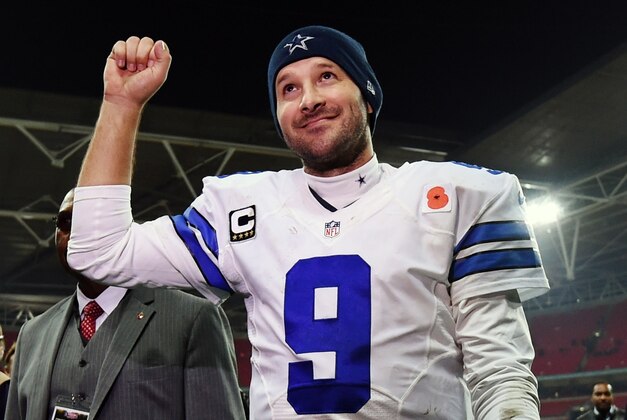 FILE - In this Nov. 9, 2014, file photo, Dallas Cowboys quarterback Tony Romo acknowledges spectators after the team's 31-17 victory over the Jacksonville Jaguars in an NFL football game at Wembley Stadium in London. Romo will play the New York Giants on Sunday night, Nov. 23, then figure out if his surgically repaired back can hold up for the quick Thanksgiving turnaround. (AP Photo/Tim Ireland, File)