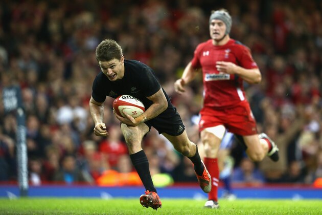 CARDIFF, WALES - NOVEMBER 22:  Beauden Barrett (L) of the All Blacks scores his sides third try during the International match between Wales and New Zealand at the Millennium Stadium on November 22, 2014 in Cardiff, Wales.  (Photo by Michael Steele/Getty Images)