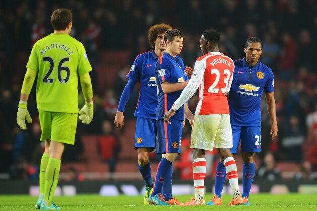 LONDON, ENGLAND - NOVEMBER 22: Paddy McNair of Manchester United shakes hands with Danny Welbeck of Arsenal after the Barclays Premier League match between Arsenal and Manchester United at Emirates Stadium on November 22, 2014 in London, England.  (Photo by Michael Regan/Getty Images)