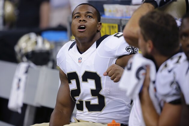 New Orleans Saints running back Pierre Thomas (23) sits on the bench in the second half of an NFL preseason football game against the Baltimore Ravens in New Orleans, Thursday, Aug. 28, 2014. (AP Photo/Bill Haber)