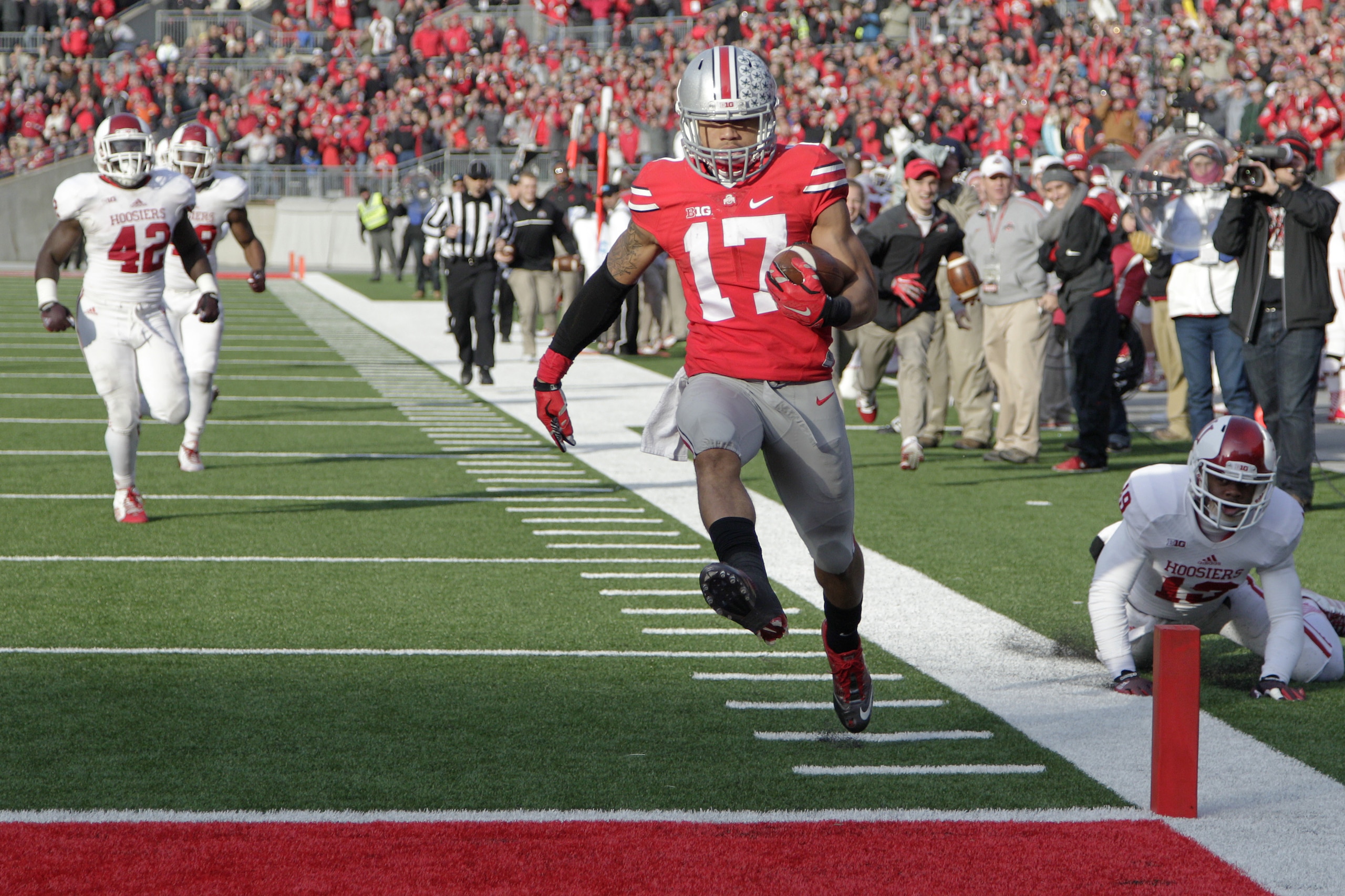 Ohio State running back Jalin Marshall (17) scores a touchdown against Indiana during the fourth quarter of an NCAA college football game Saturday, Nov. 22, 2014, in Columbus, Ohio. Ohio State won 42-27. (AP Photo/Jay LaPrete)