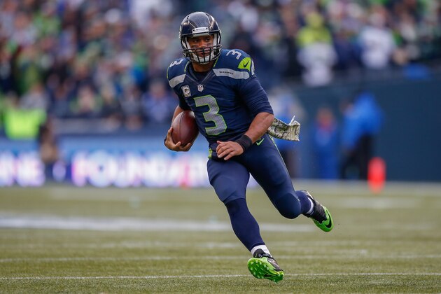 SEATTLE, WA - NOVEMBER 09:  Quarterback Russell Wilson #3 of the Seattle Seahawks rushes against the New York Giants in the first half at CenturyLink Field on November 9, 2014 in Seattle, Washington. The Seahawks defeated the Giants 38-17.  (Photo by Otto Greule Jr/Getty Images)