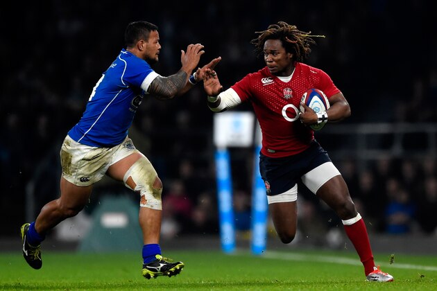LONDON, ENGLAND - NOVEMBER 22:  Marland Yarde of England hands off Alapati Leiua of Samoa during the QBE international match between England and Samoa at Twickenham Stadium on November 22, 2014 in London, England..  (Photo by Mike Hewitt/Getty Images)