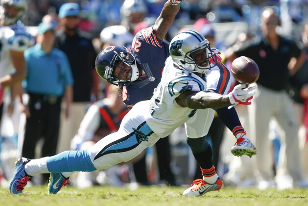 Carolina Panthers wide receiver Jason Avant (81) dives for a pass against Chicago Bears cornerback Tim Jennings (26) during an NFL game at Bank of America Stadium in Charlotte, N.C. on Sunday, Oct. 5, 2014. (Chris Keane/AP Images for Panini)