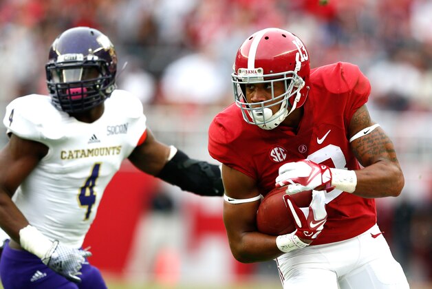 TUSCALOOSA, AL - NOVEMBER 22:  ArDarius Stewart #13 of the Alabama Crimson Tide rushes this reception against the Western Carolina Catamounts at Bryant-Denny Stadium on November 22, 2014 in Tuscaloosa, Alabama.  (Photo by Kevin C. Cox/Getty Images)