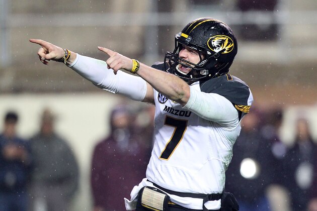 HOUSTON, TX - NOVEMBER 15: Maty Mauk #7 of the Missouri Tigers points to the Missouri Tigers fans after the Tigers defeated the Texas A&M Aggies  in an NCAA football game on November 15, 2014 at Kyle Field in College Station, Texas. The Tigers won 34-27. (Photo by Thomas B. Shea/Getty Images)