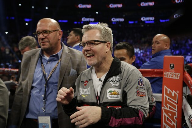 Miguel Cotto's trainer Freddie Roach reacts after a WBC World Middleweight Title boxing match against Sergio Martinez, of Argentina, Sunday, June 8, 2014, in New York.  Cotto won by technical knockout during the first ninth round. (AP Photo/Frank Franklin II)