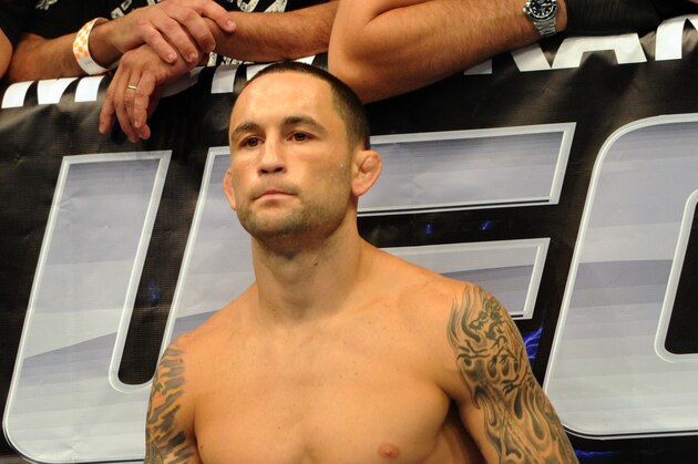Jul 6, 2013; Las Vegas, NV, USA;  Frankie Edgar (red gloves) before the start of his Featherweight Bout  against Charles Oliveira (not pictured) at the MGM Grand Garden Arena. Edgar won. Mandatory Credit: Jayne Kamin-Oncea-USA TODAY Sports