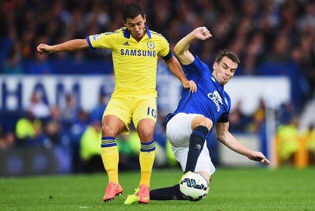 LIVERPOOL, ENGLAND - AUGUST 30:  Eden Hazard of Chelsea is tackled by Seamus Coleman of Everton during the Barclays Premier League match between Everton and Chelsea at Goodison Park on August 30, 2014 in Liverpool, England.  (Photo by Laurence Griffiths/Getty Images)