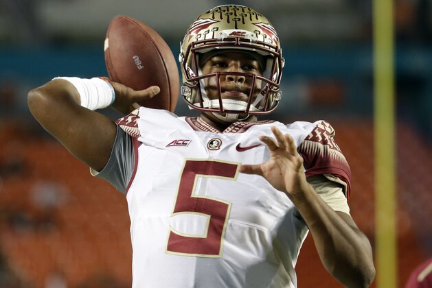 Florida State quarterback Jameis Winston warms up before an NCAA football game against Miami, Saturday, Nov. 15, 2014, in Miami Gardens, Fla. (AP Photo/Lynne Sladky)