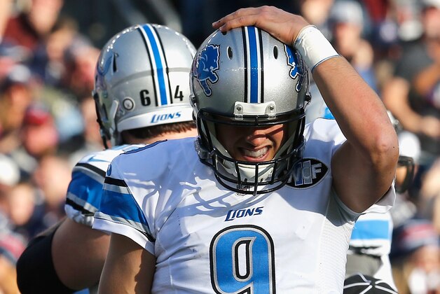FOXBORO, MA - NOVEMBER 23:  Matthew Stafford #9 of the Detroit Lions reacts during the first quarter against the New England Patriots at Gillette Stadium on November 23, 2014 in Foxboro, Massachusetts.  (Photo by Jim Rogash/Getty Images)