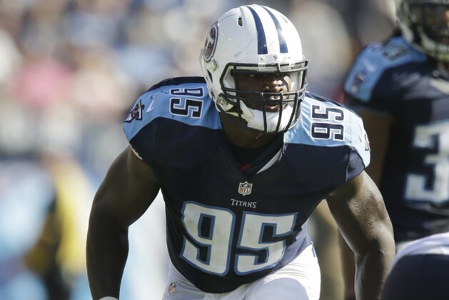 Tennessee Titans linebacker Kamerion Wimbley (95) lines up against the Houston Texans in the third quarter of an NFL football game Sunday, Oct. 26, 2014, in Nashville, Tenn. (AP Photo/Wade Payne)