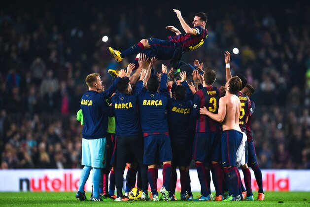 BARCELONA, SPAIN - NOVEMBER 22:  Lionel Messi of FC Barcelona celebrates with his teammates at the end of the La Liga match between FC Barcelona and Sevilla FC at Camp Nou on November 22, 2014 in Barcelona, Spain. Lionel Messi beat the  number of goal in the Spanish La Liga of Telmo Zarra scoring his 252nd goal.  (Photo by David Ramos/Getty Images)