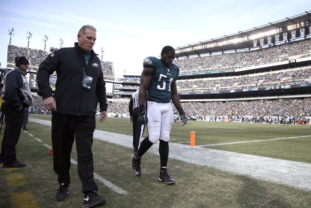 Philadelphia Eagles' Emmanuel Acho walks to the locker room during the first half of an NFL football game against the Tennessee Titans, Sunday, Nov. 23, 2014, in Philadelphia. (AP Photo/Michael Perez)