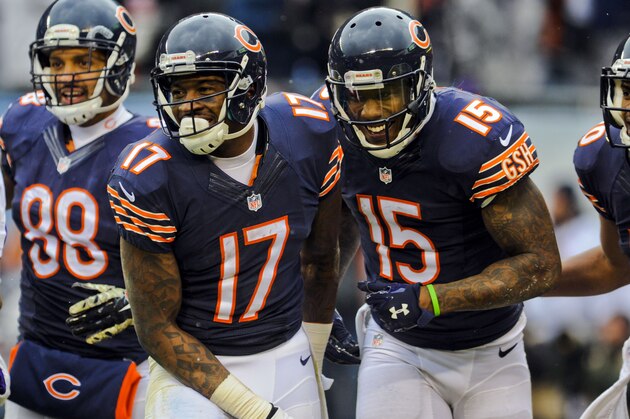 Nov 16, 2014;  Chicago, IL, USA;  Chicago Bears wide receiver Brandon Marshall (15) celebrates his touchdown with tight end Dante Rosario (88), wide receiver Alshon Jeffery (17) and wide receiver Marquess Wilson (10)  against the Minnesota Vikings at Soldier Field. Mandatory Credit: Matt Marton-USA TODAY Sports