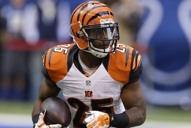 Cincinnati Bengals running back Giovani Bernard (25) runs during the first half of an NFL football game against the Indianapolis Colts Sunday, Oct. 19, 2014, in Indianapolis. (AP Photo/Michael Conroy)