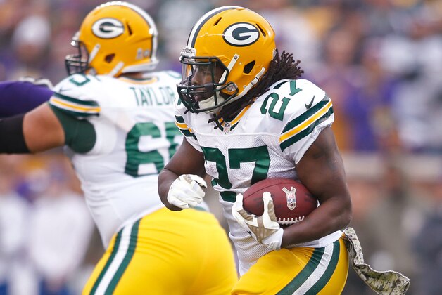 Nov 23, 2014; Minneapolis, MN, USA; Green Bay Packers running back Eddie Lacy (27) rushes against the Minnesota Vikings in the first quarter at TCF Bank Stadium. The Green Bay Packers win 24-21. Mandatory Credit: Bruce Kluckhohn-USA TODAY Sports