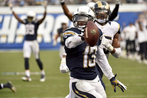 San Diego Chargers wide receiver Keenan Allen celebrates after scoring against the St. Louis Rams during the second half of an NFL football game, Sunday, Nov. 23, 2014, in San Diego. (AP Photo/Denis Poroy)