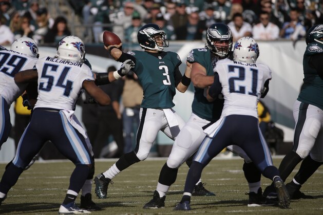 Philadelphia Eagles' Mark Sanchez passes during the first half of an NFL football game against the Tennessee Titans, Sunday, Nov. 23, 2014, in Philadelphia. (AP Photo/Michael Perez)