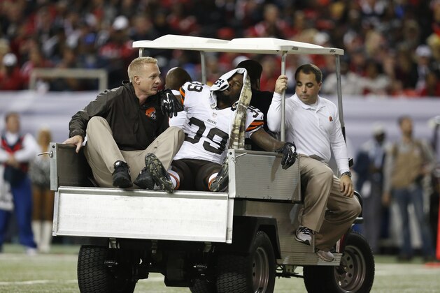 Cleveland Browns free safety Tashaun Gipson (39) is taken off the field after being injured against the Atlanta Falcons during the second half of an NFL football game, Sunday, Nov. 23, 2014, in Atlanta. (AP Photo/Brynn Anderson)