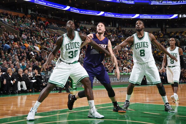 BOSTON, MA - NOVEMBER 17: Brandon Bass #30 and Jeff Green #8 of the Boston Celtics look for the rebound against Miles Plumlee #22 of the Phoenix Suns during the game on November 17, 2014 at TD Garden in Boston, Massachusetts. NOTE TO USER: User expressly acknowledges and agrees that, by downloading and or using this Photograph, user is consenting to the terms and conditions of the Getty Images License Agreement. Mandatory Copyright Notice: Copyright 2014 NBAE (Photo by Brian Babineau/NBAE via Getty Images)