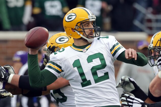 Green Bay Packers quarterback Aaron Rodgers throws during the second half of an NFL football game against the Minnesota Vikings, Sunday, Nov. 23, 2014, in Minneapolis. (AP Photo/Jim Mone)