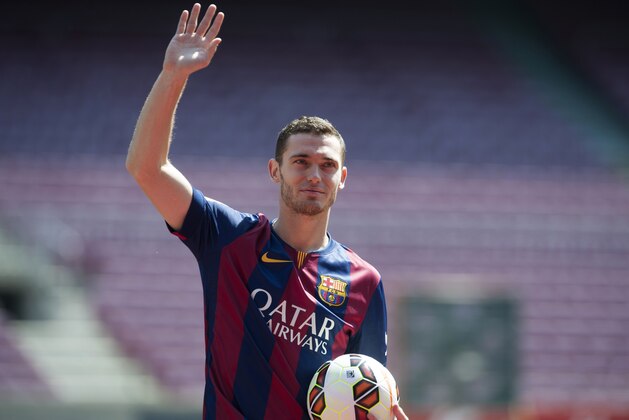 FC Barcelona's new Belgian Thomas Vermaelen gestures during his official presentation at the Camp Nou stadium in Barcelona, Spain, Sunday, Aug. 10, 2014. Vermaelen agreed to sign a five-year contract. The 28-year-old Vermaelen will now be under the orders of Barcelona's new coach Luis Enrique. (AP Photo/Rodolfo Molina)