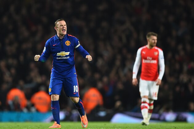 LONDON, ENGLAND - NOVEMBER 22:  Wayne Rooney of Manchester United celebrates the own goal scored by Kieran Gibbs of Arsenal during the Barclays Premier League match between Arsenal and Manchester United at Emirates Stadium on November 22, 2014 in London, England.  (Photo by Shaun Botterill/Getty Images)