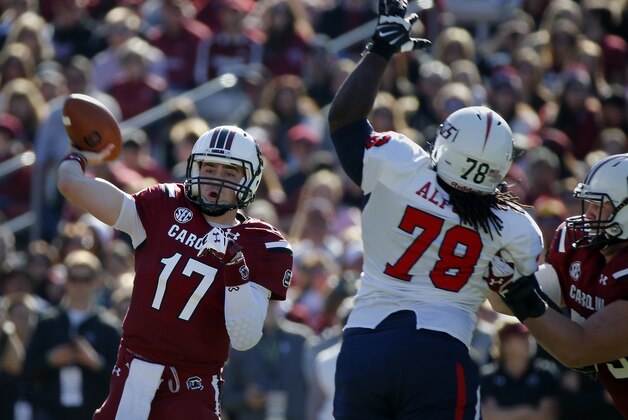 South Carolina quarterback Dylan Thompson (17) throws down field during the first half of an NCAA college football game against South Alabama in Columbia, S.C., Saturday, Nov. 22, 2014. (AP Photo/Stephen B. Morton)