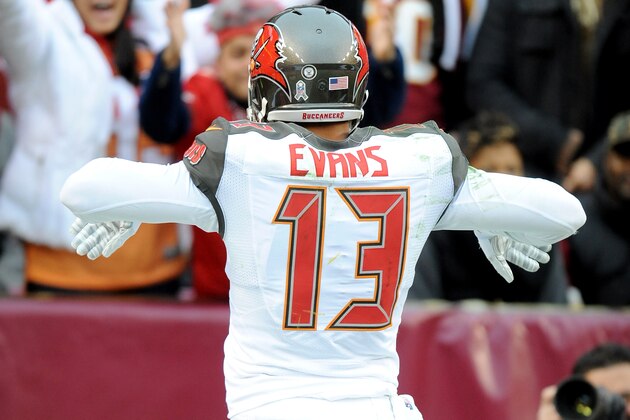 LANDOVER, MD - NOVEMBER 16:  Wide receiver Mike Evans #13 of the Tampa Bay Buccaneers celebrates after catching a fourth quarter touchdown against the Washington Redskins at FedExField on November 16, 2014 in Landover, Maryland.  (Photo by Mitchell Layton/Getty Images)