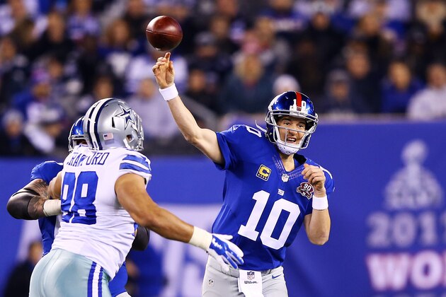 EAST RUTHERFORD, NJ - NOVEMBER 23:   Eli Manning #10 of the New York Giants passes in the first quarter against the Dallas Cowboys at MetLife Stadium on November 23, 2014 in East Rutherford, New Jersey.  (Photo by Al Bello/Getty Images)