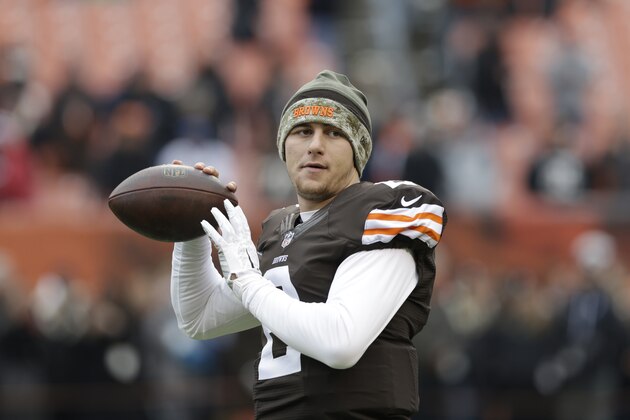 Cleveland Browns quarterback Johnny Manziel warms up before an NFL football game against the Houston Texans Sunday, Nov. 16, 2014, in Cleveland. (AP Photo/Tony Dejak)