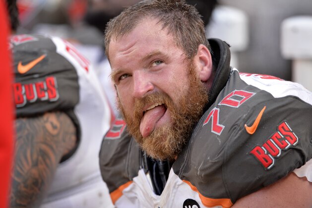 Tampa Bay Buccaneers guard Logan Mankins (70) sits on the beN.C.h during an NFL football game against the Cleveland Browns Sunday, Nov. 2, 2014, in Cleveland. The Browns won 22-17. (AP Photo/David Richard)