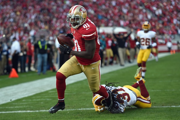 SANTA CLARA, CA - NOVEMBER 23:  Anquan Boldin #81 of the San Francisco 49ers scores the first touchdown as Brandon Meriweather #31 of the Washington Redskins tries to make the tackle at Levi's Stadium on November 23, 2014 in Santa Clara, California.  (Photo by Thearon W. Henderson/Getty Images)