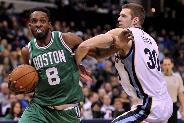 Boston Celtics forward Jeff Green (8) tries to get past Memphis Grizzlies forward Jon Leuer (30) in the second half of an NBA basketball game Friday, Nov. 21, 2014, in Memphis, Tenn. The Grizzlies beat the Celtics 117-100. (AP Photo/Brandon Dill)