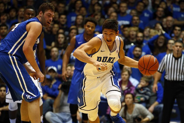 Duke's Grayson Allen (3) bring the ball down the court during the second half of an NCAA college basketball game against the Presbyterian in Durham, N.C., Friday, Nov. 14, 2014. (AP Photo/Karl B DeBlaker)