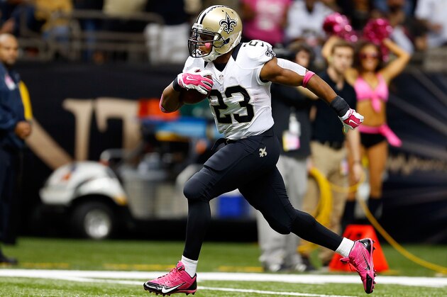 NEW ORLEANS, LA - OCTOBER 05:  Pierre Thomas #23 of the New Orleans Saints rushes for a touchdown during the fourth quarter of a game against the Tampa Bay Buccaneers at the Mercedes-Benz Superdome on October 5, 2014 in New Orleans, Louisiana.  (Photo by Wesley Hitt/Getty Images)