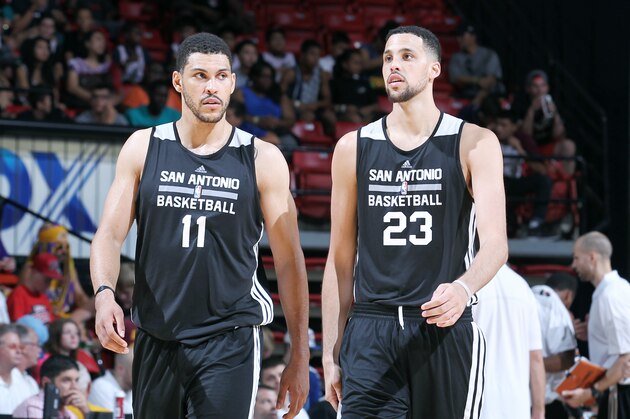LAS VEGAS, NV - JULY 17: Jeff Ayres #11 and Austin Daye #23 of the San Antonio Spurs stand on the court during a game against the Utah Jazz during the Samsung NBA Summer League 2014 on July 17, 2014 at the Cox Pavilion in Las Vegas, Nevada. NOTE TO USER: User expressly acknowledges and agrees that, by downloading and or using this photograph, User is consenting to the terms and conditions of the Getty Images License Agreement. Mandatory Copyright Notice: Copyright 2014 NBAE (Photo by Jack Arent/NBAE via Getty Images)