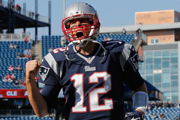 FOXBORO, MA - NOVEMBER 23:  Tom Brady #12 of the New England Patriots reacts prior to the game against the Detroit Lions at Gillette Stadium on November 23, 2014 in Foxboro, Massachusetts.  (Photo by Jim Rogash/Getty Images)