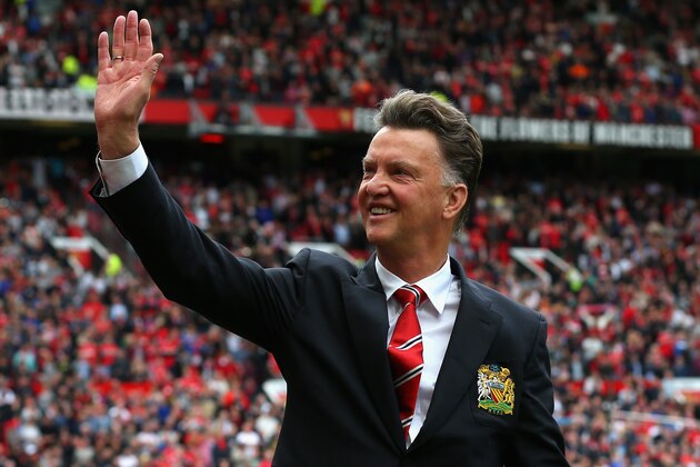 MANCHESTER, ENGLAND - AUGUST 16:  Manchester United Manager Louis van Gaal waves to the crowd prior to the Barclays Premier League match between Manchester United and Swansea City at Old Trafford on August 16, 2014 in Manchester, England.  (Photo by Alex Livesey/Getty Images)