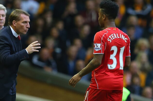 LIVERPOOL, ENGLAND - OCTOBER 25:  Brendan Rodgers the manager of Liverpool talks with Raheem Sterling during the Barclays Premier League match between Liverpool and Hull City at Anfield on October 25, 2014 in Liverpool, England.  (Photo by Alex Livesey/Getty Images)