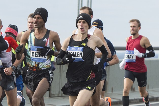 Nov 2, 2014; New York, NY, USA; Gebre Gebremariam (ETH) and Frank Bollen (BEL) runs at Verrazano-Narrows Bridge. Mandatory Credit: Gregory J. Fisher-USA TODAY Sports