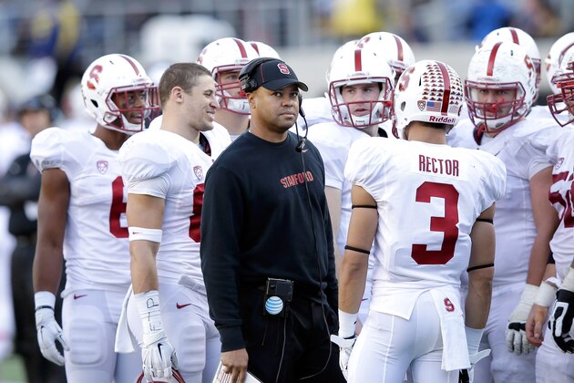 BERKELEY, CA - NOVEMBER 22:  Head coach David Shaw of the Stanford Cardinal  stands with his team during their game against the California Golden Bears at California Memorial Stadium on November 22, 2014 in Berkeley, California.  (Photo by Ezra Shaw/Getty Images)